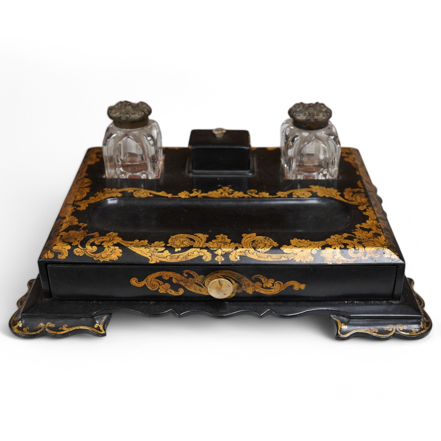 A Victorian black lacquer and gilt decorated two bottle ink stand with drawer. 36cm sided x 28cm deep. Condition - some lacquered missing.